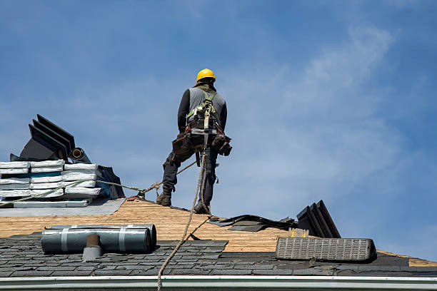 Professional Roofing technician working in Highland, CA